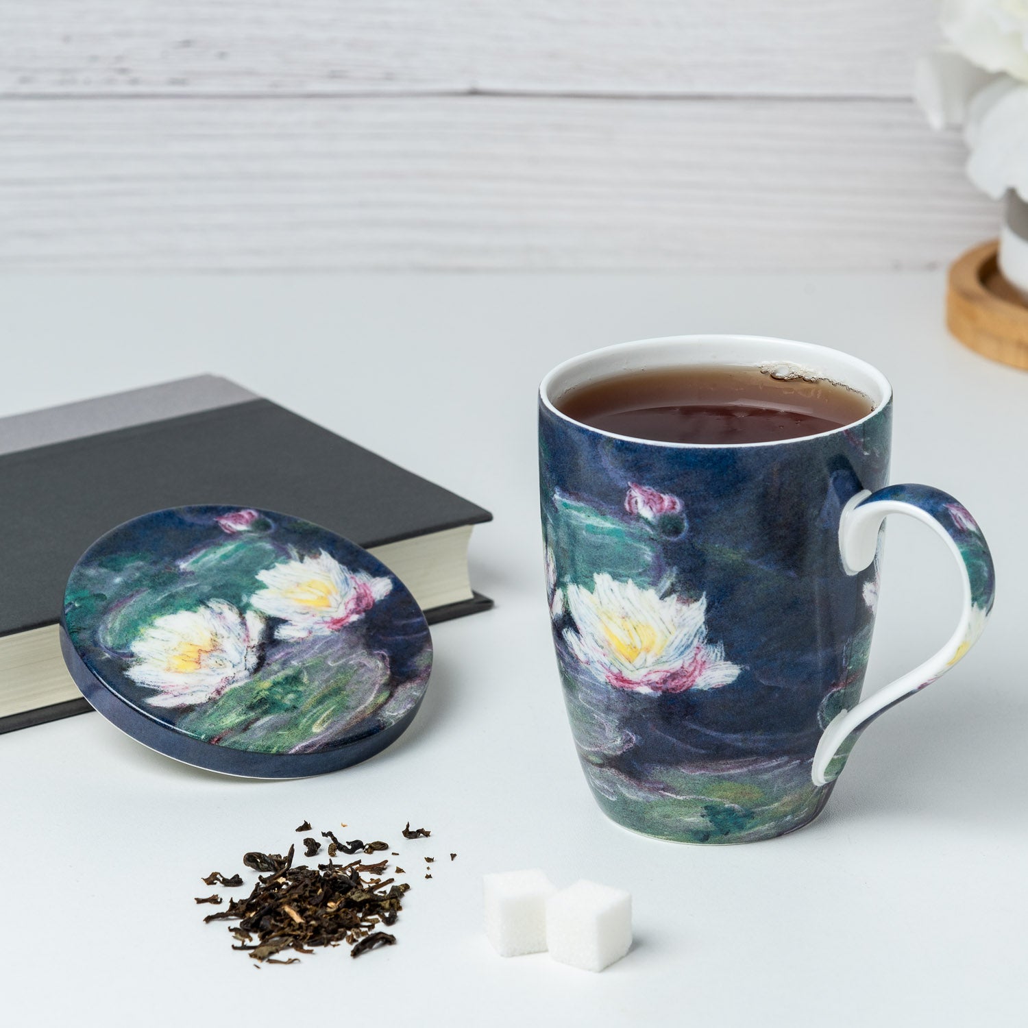 Claude Monet Water Lilies Tea Mug in fine bone china, lifestyle image styled on a countertop with tea