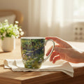 Water Lilies by Claude Monet Latte mug  in a cozy home setting