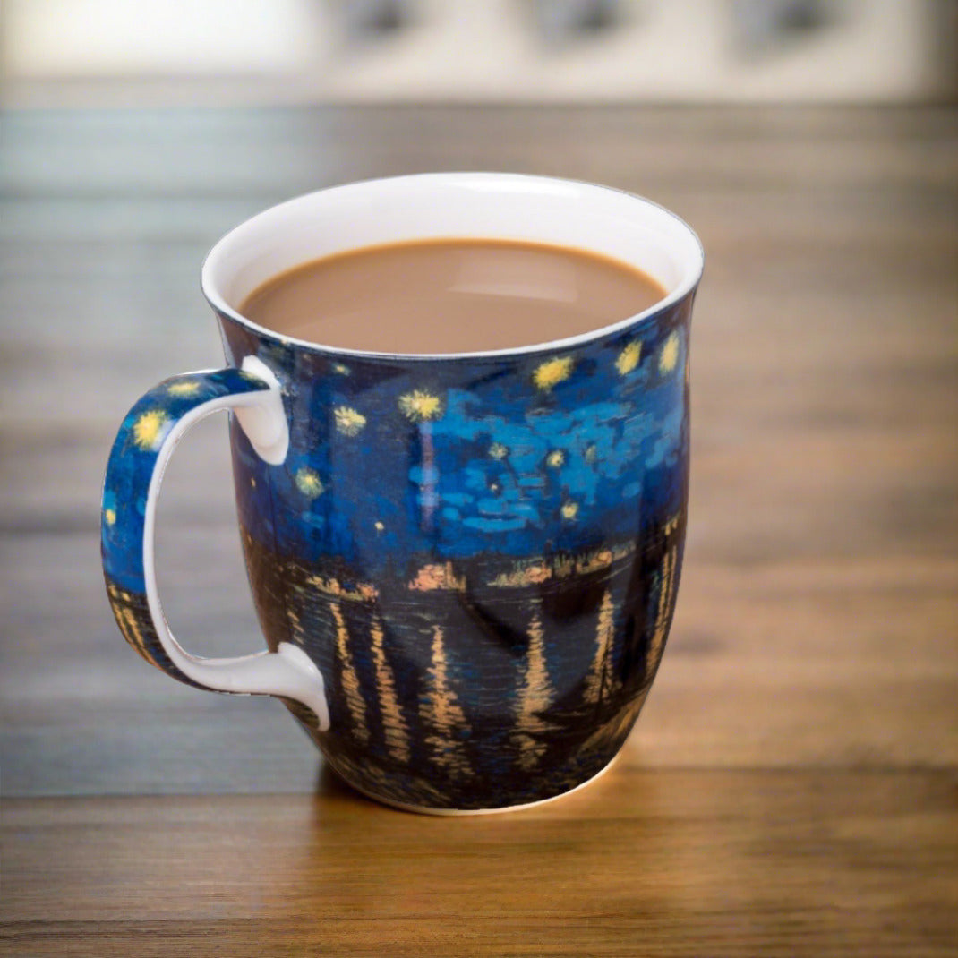 Starry Night over the Rhone by Vincent Van Gogh Java mug with coffee in a cozy setting