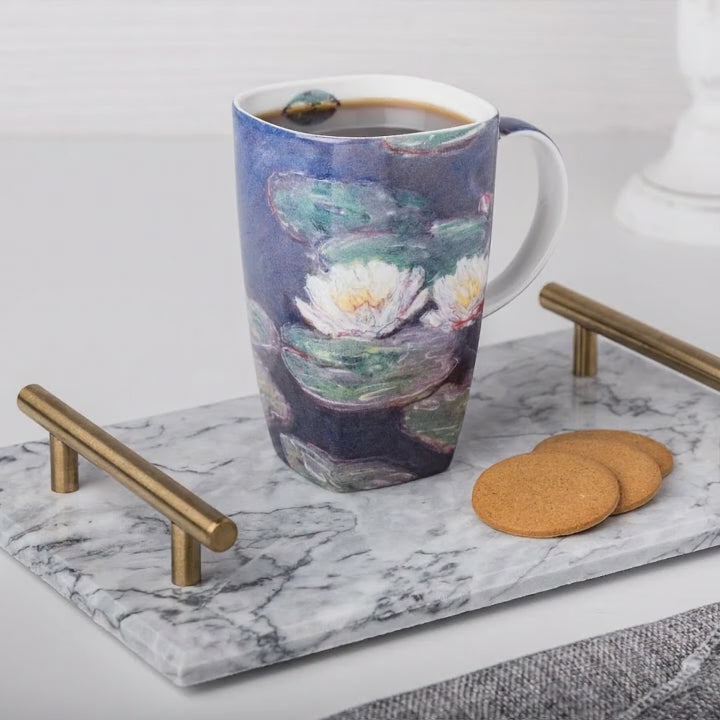 Fine bone china Grande mug featuring Monet Water Lilies artwork, shown with coffee in a clean, styled setting