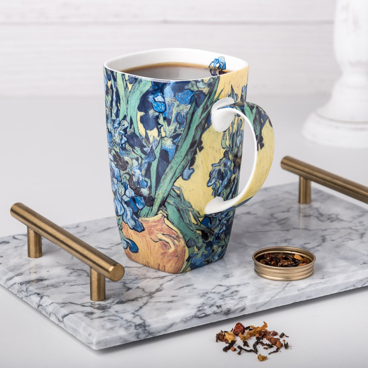 Van Gogh Irises Grande Mug, lifestyle image styled in a bright kitchen setting, with coffee