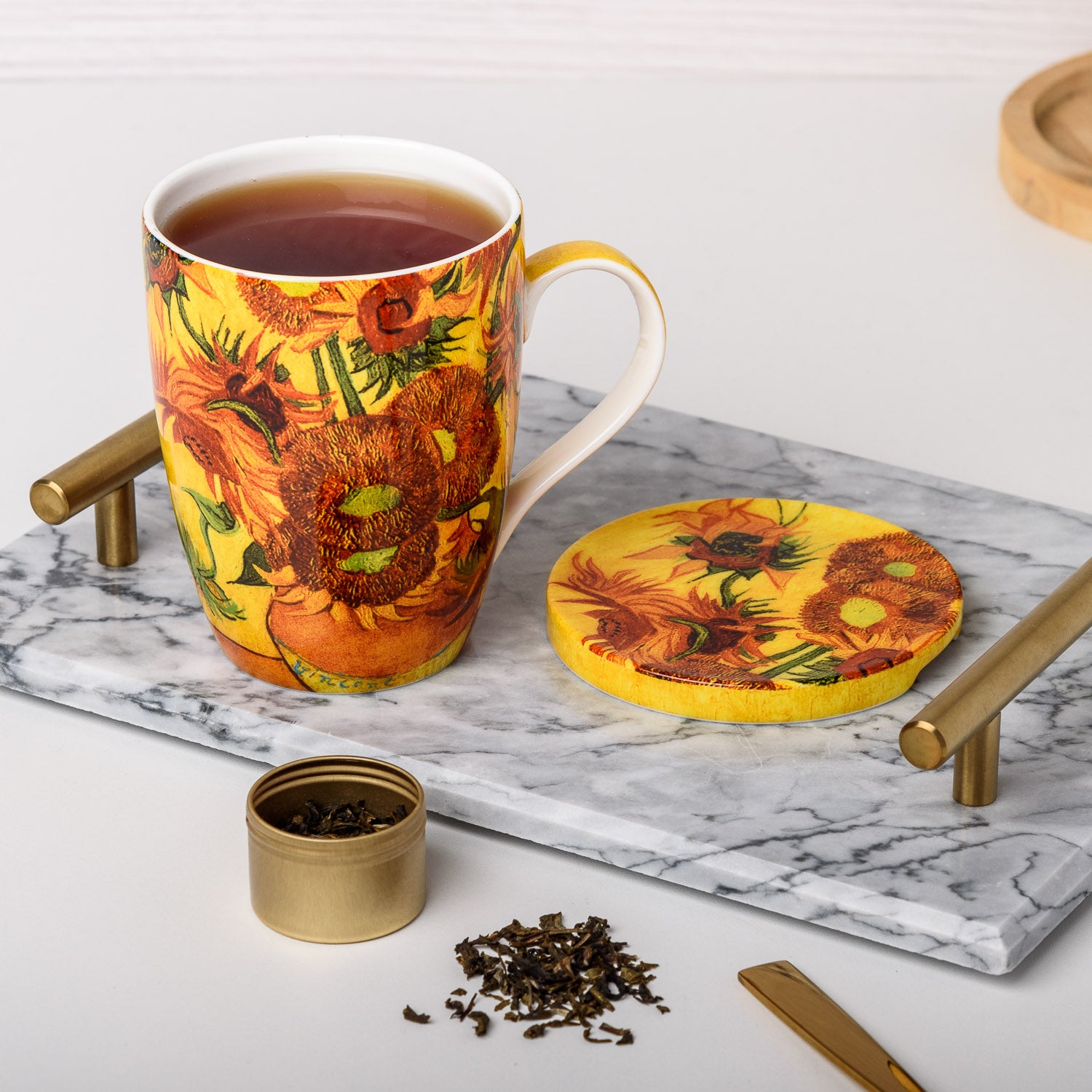 Van Gogh Sunflowers Tea Mug in fine bone china, lifestyle image styled on a countertop with tea